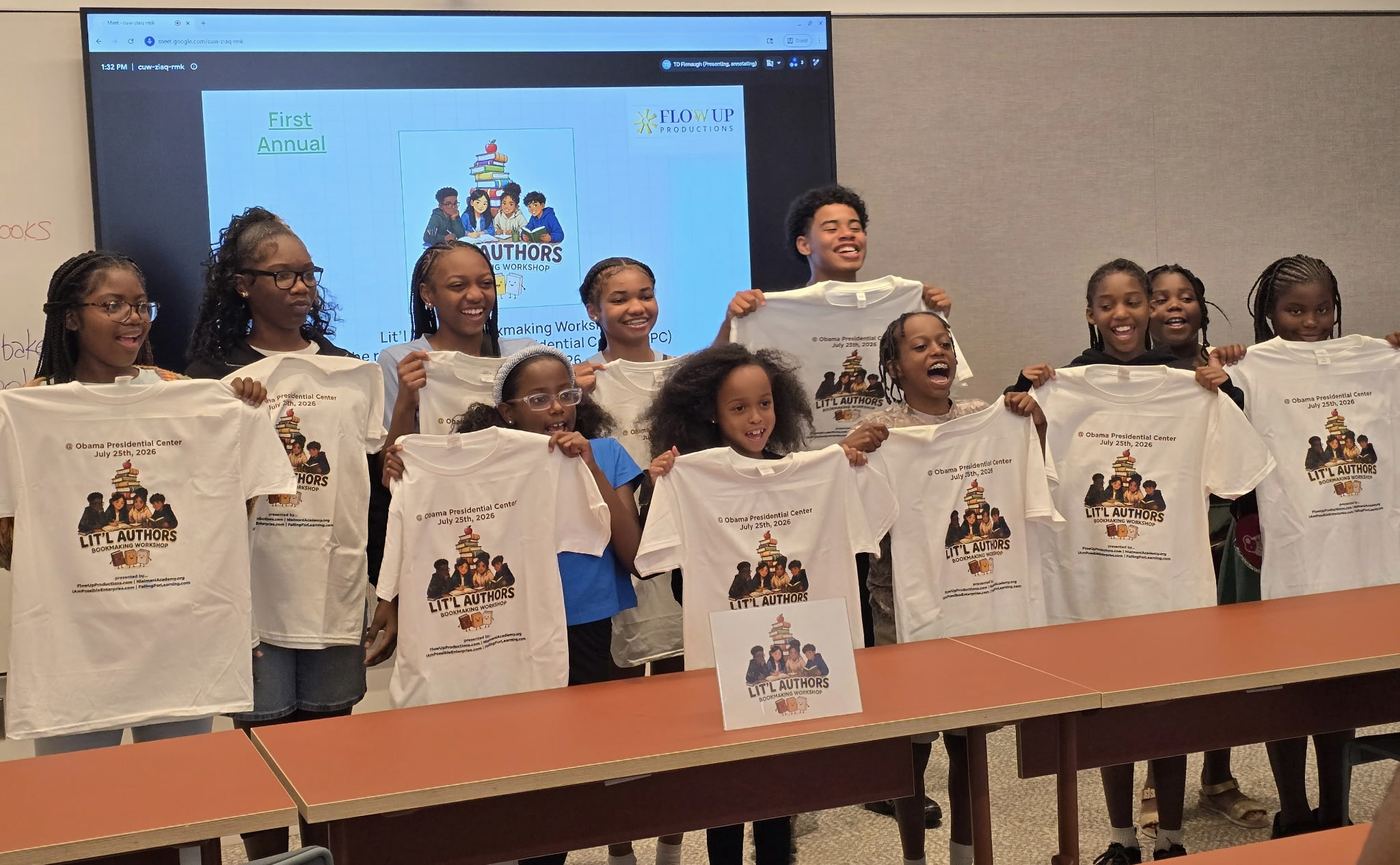 Lit'l Authors Bookmaking Workshop participants holding up their event t-shirts